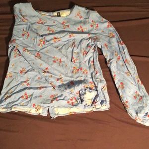 blue floral shirt fits like a small